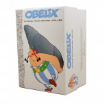 Asterix Series: Obelix with pile of magazines