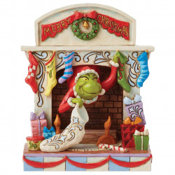 The Grinch designed by Jim Shore: Grinch "Peaking out of fireplace"