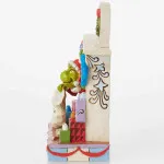 The Grinch designed by Jim Shore: Grinch "Peaking out of fireplace"